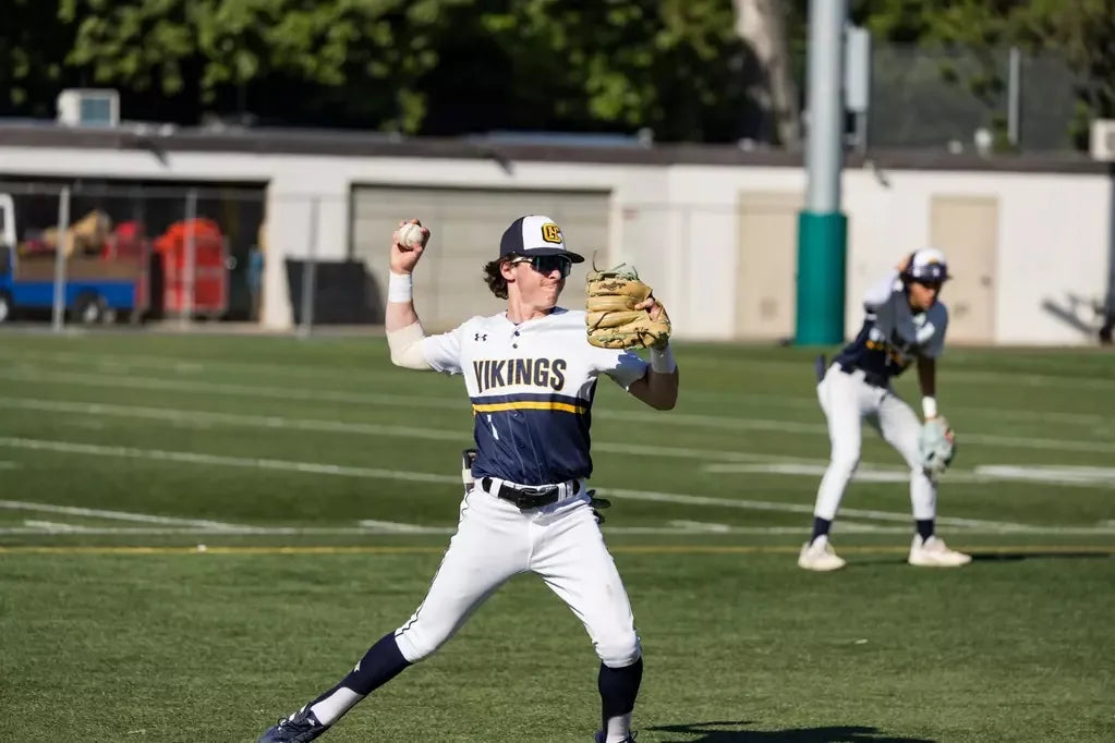 Campbell Hall Vikings baseball player making a throw
