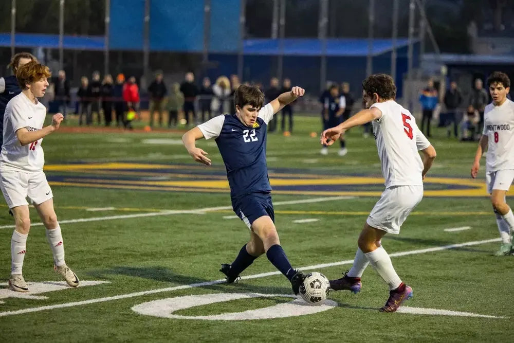 Campbell Hall soccer player on the ball during a match